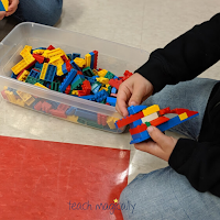 Kid building with connecting blocks Teach Magically
