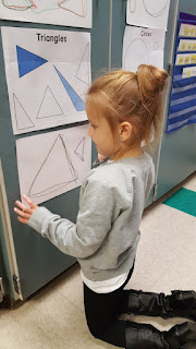 Student tracing triangle while kneeling Teach Magically